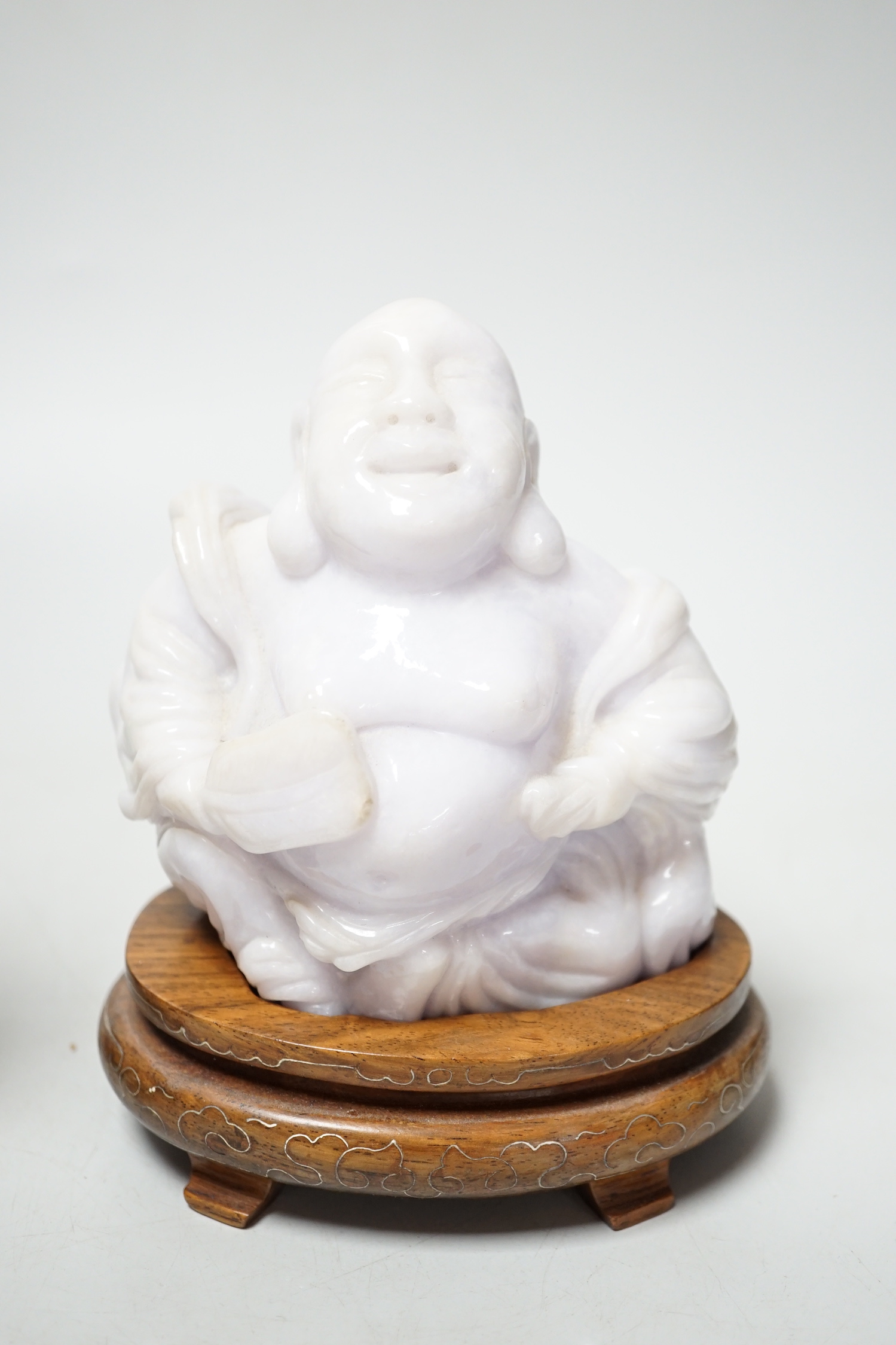 A Chinese jadeite figure of Budai, 11cm high and a rose quartz figure of a lady, wood stands